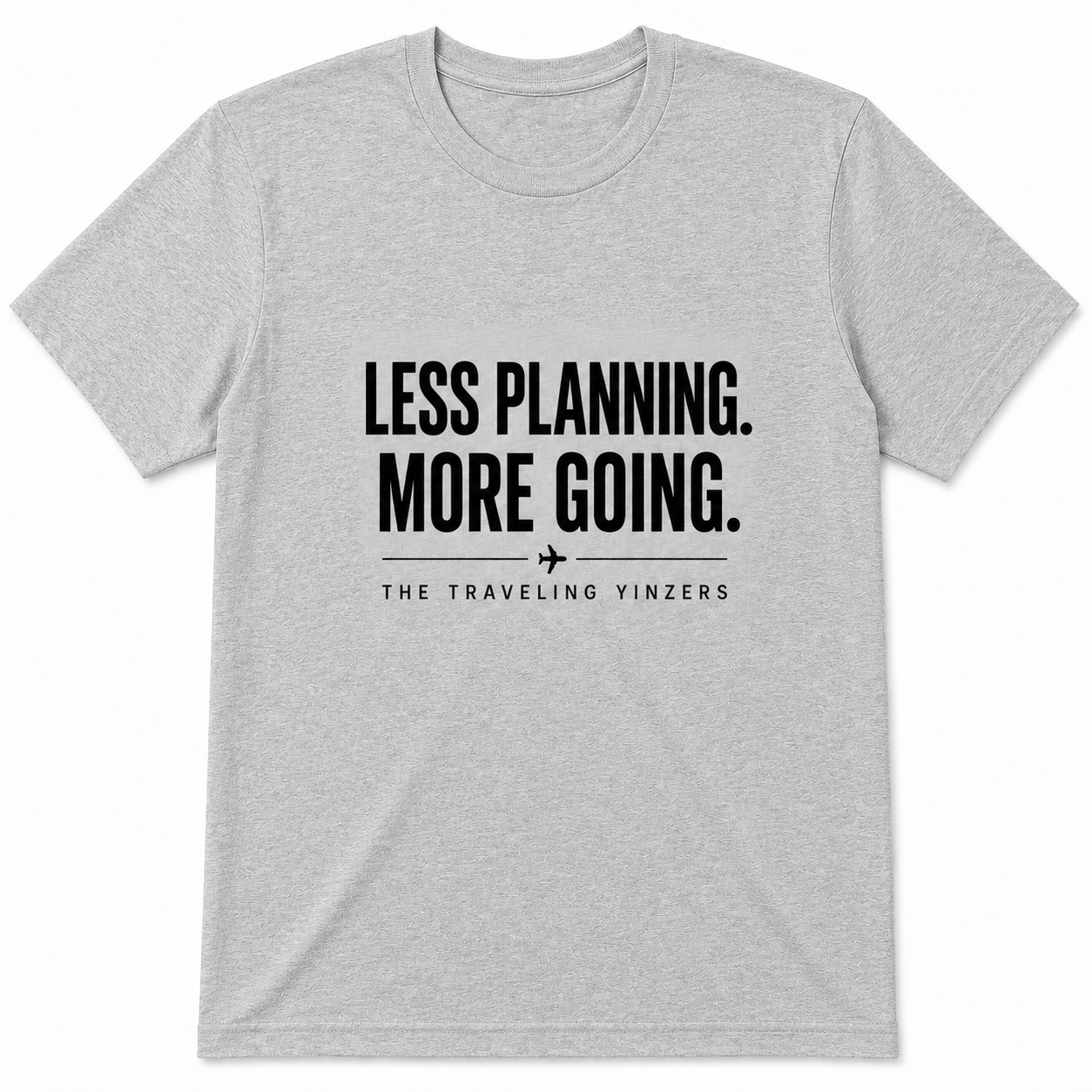 Grey t-shirt with Less Planning More Going bold text and airplane accent by The Traveling Yinzers