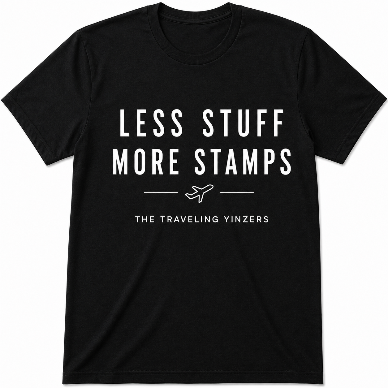 Black t-shirt with Less Stuff More Stamps text and airplane graphic by The Traveling Yinzers